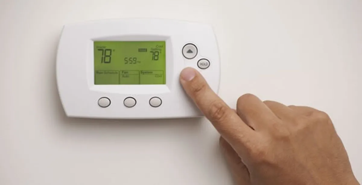 Digital thermostat installation with precise temperature programming in West Palm Beach, FL