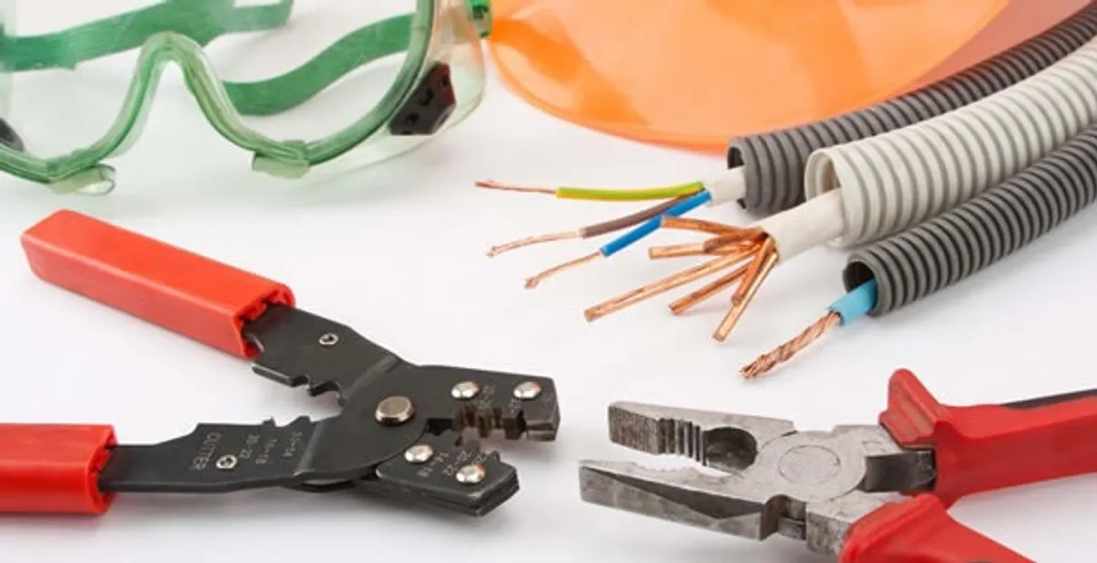 Electrical wiring repair with professional tools and safety equipment in North Palm Beach, FL
