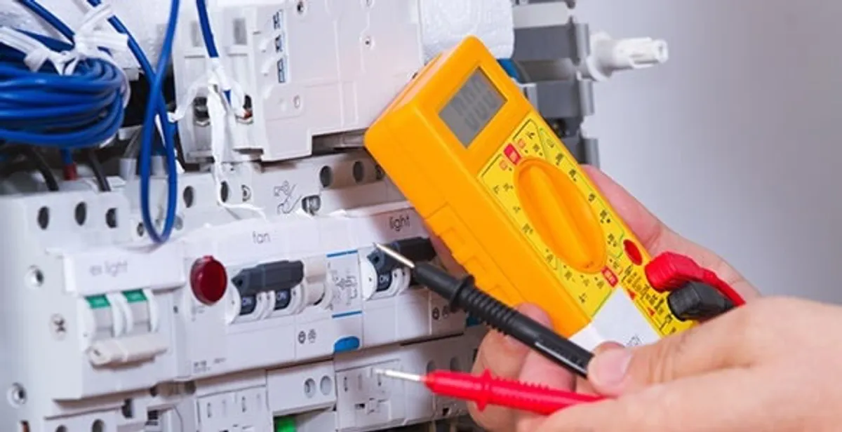 Residential electrician testing home electrical panel for safety and performance in West Palm Beach, FL